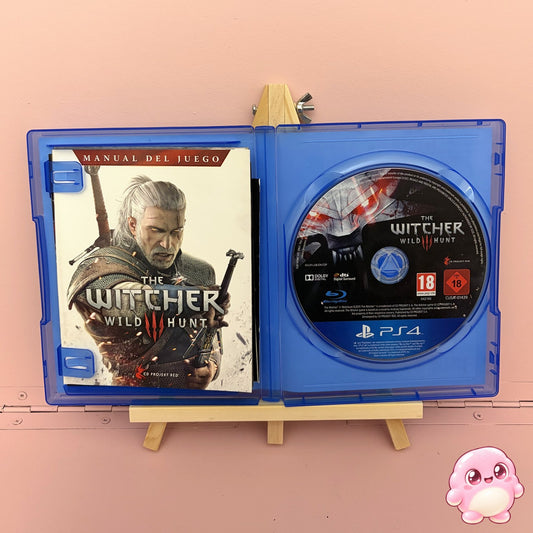 The Witcher 3: Wild Hunt PS4 - caja abierta con disco y manual